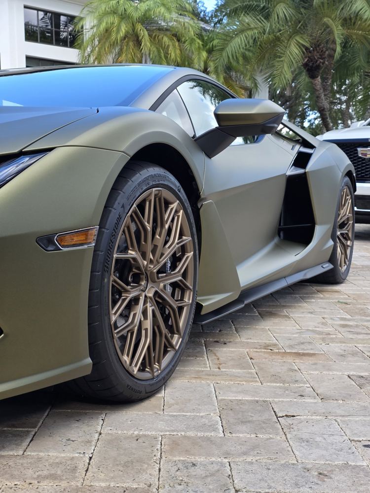 Matte green Lamborghini with bronze wheels, matte paint care