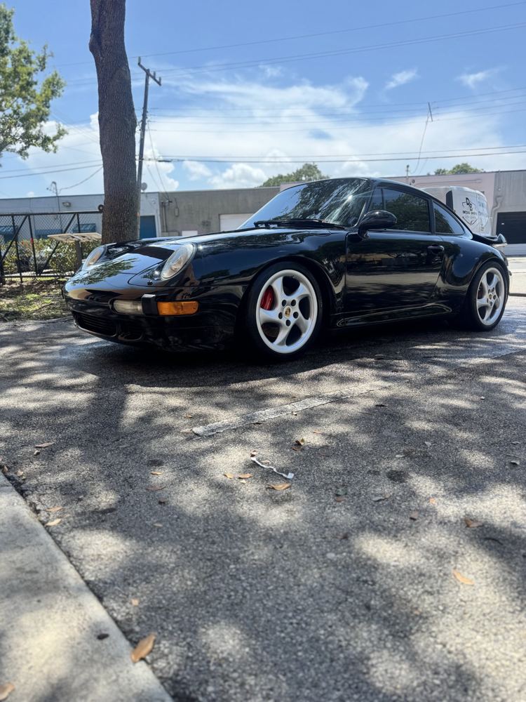 Black classic Porsche 911 Turbo 993 after detailing