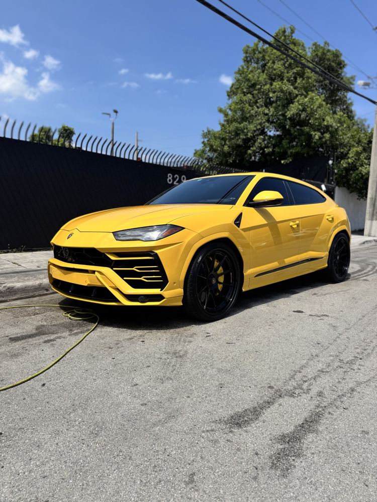 Yellow Lamborghini Urus after mobile detailing